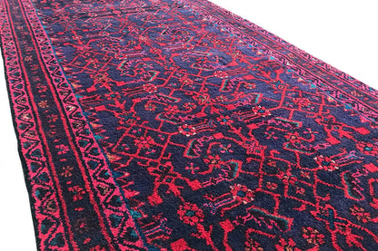 Hamadan runner close-up: dense burgundy ornamental pattern on dark blue