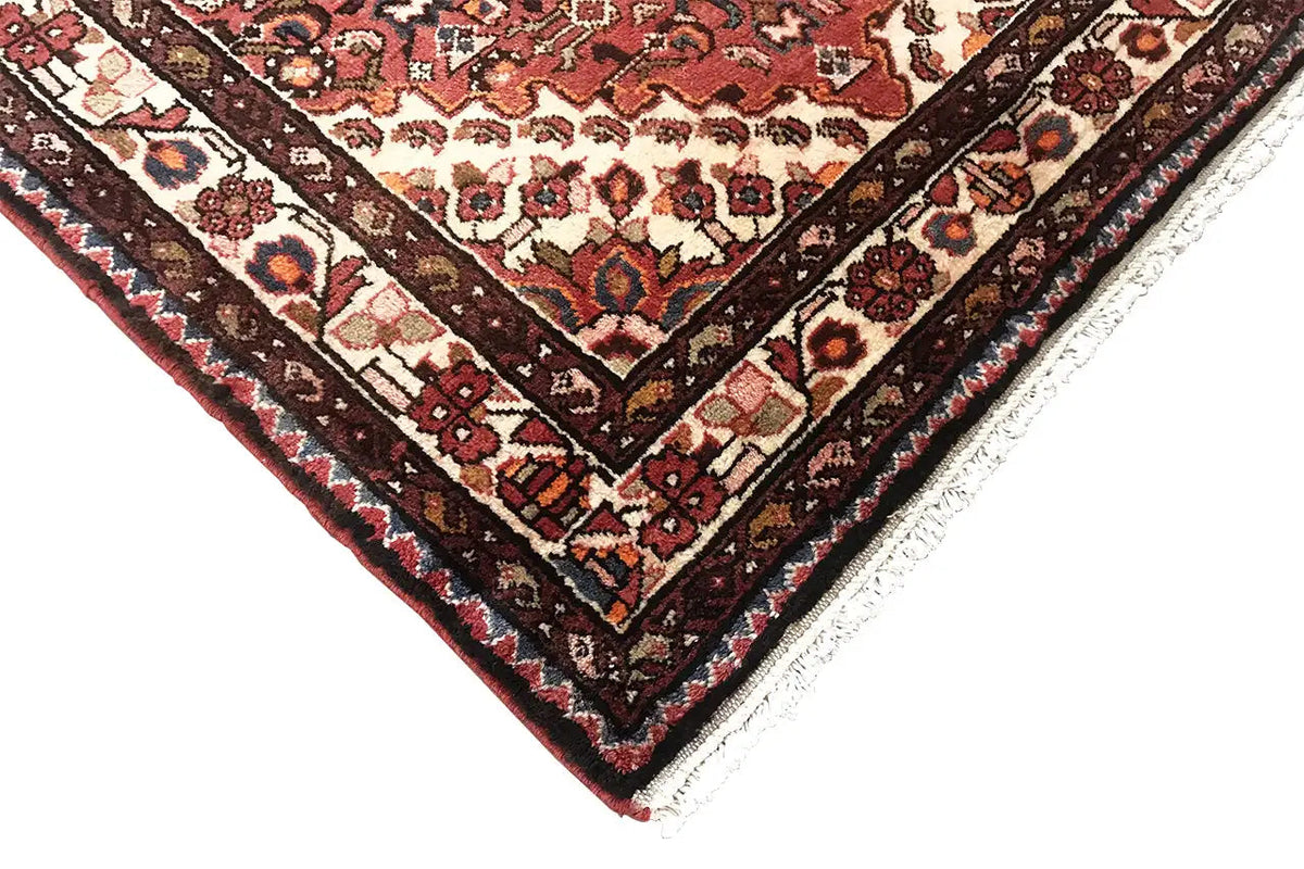Hamadan runner corner with a colorful diamond and medallion pattern