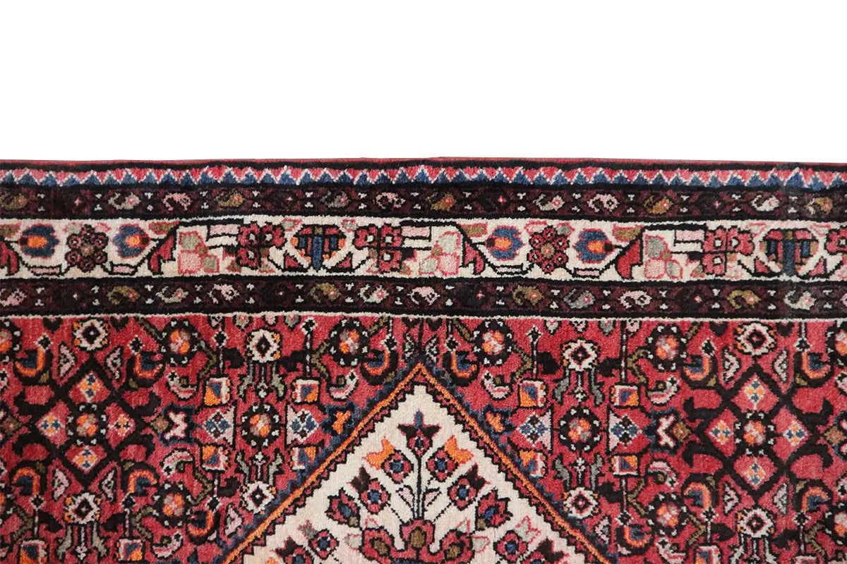 Close-up of the border strip with decorative trim on a Hamadan runner