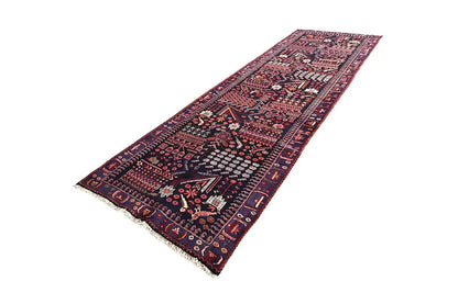 Runner rug with a geometric Oriental pattern, dark blue and red, with a short fringe border