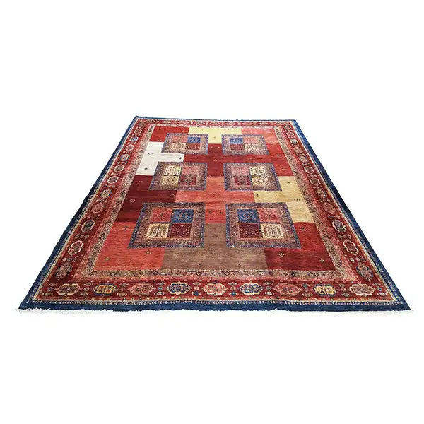 Rug with a red central field, yellow accents and a blue border frieze