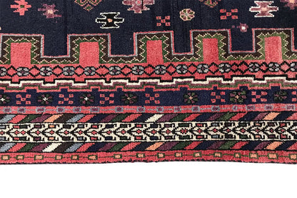 Sirjan runner edge detail: patterned border in dark blue, red, and green with fringes