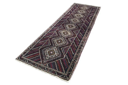 Dark runner with zigzag and diamond design, multicolored accents