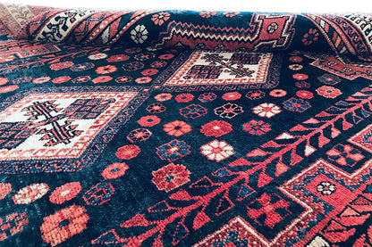 Rug surface with medallions and ornaments in dark blue, red and white