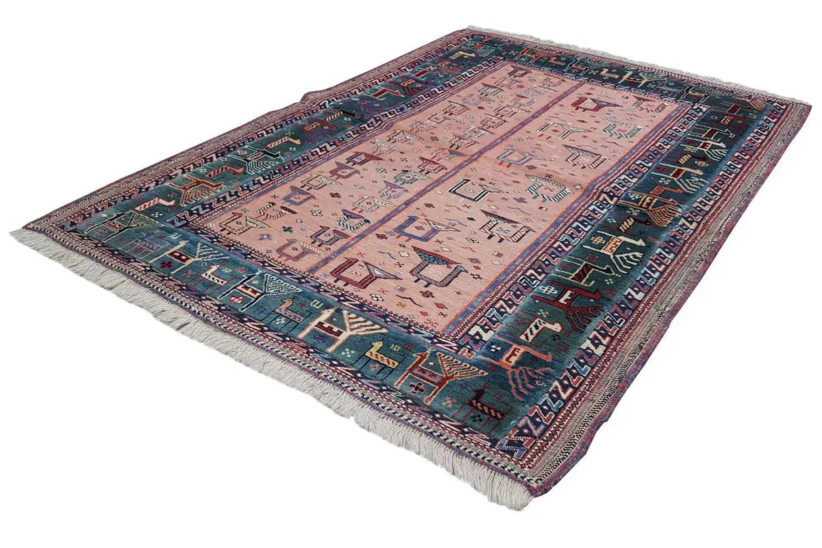 Soumak rug with a geometric pattern, pink-beige field, blue-red border, fringes