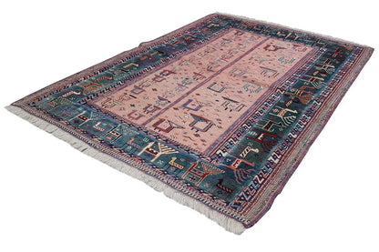 Soumak rug with a geometric pattern, pink-beige field, blue-red border, fringes