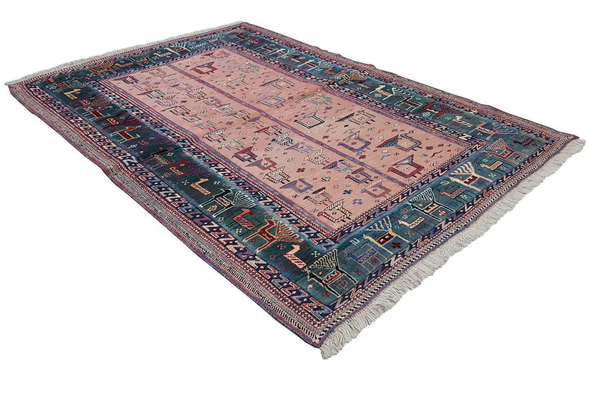 Soumak rug with a geometric pattern, pink-beige center, dark blue border, fringe