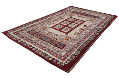 Rug 168x106 cm with border and medallion design in red, beige, and blue