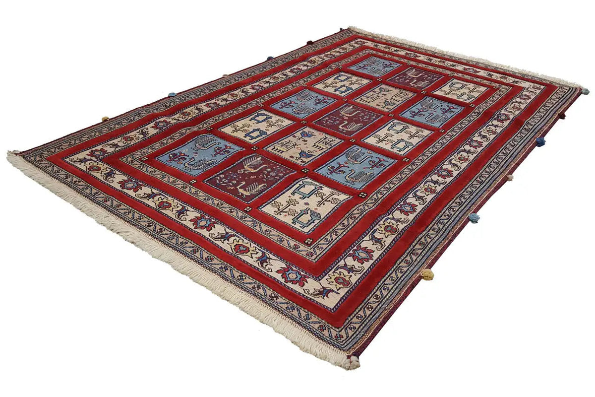 Soumak rug 179x117 cm with a red background and geometric motifs, fringes along the edges