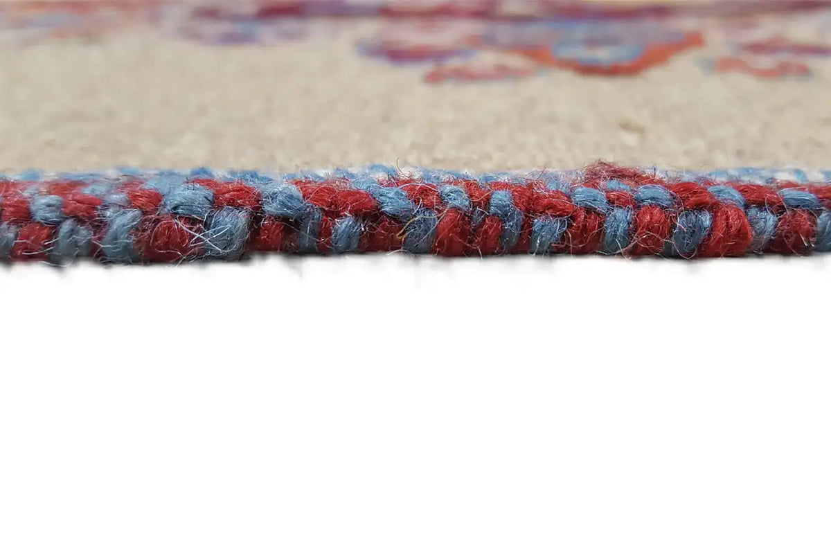 Close-up of a Soumakh rug: colorful selvedge with fringes and dense pile