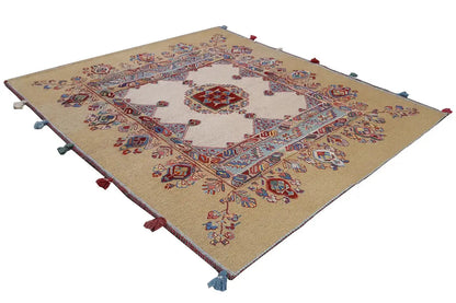 Soumak rug (118x103 cm), beige background, blue-red border, colorful tassels at the corners