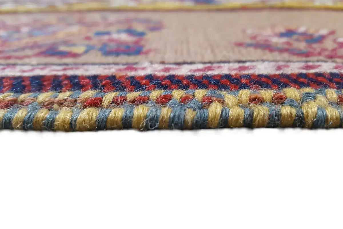 Soumak rug: bound carpet edge with a multicolored fringe roll