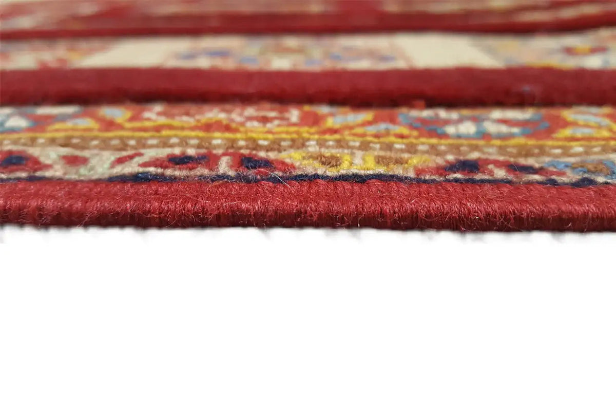 Soumak rug (147 x 103 cm): red border, multicolored patterns, fringes