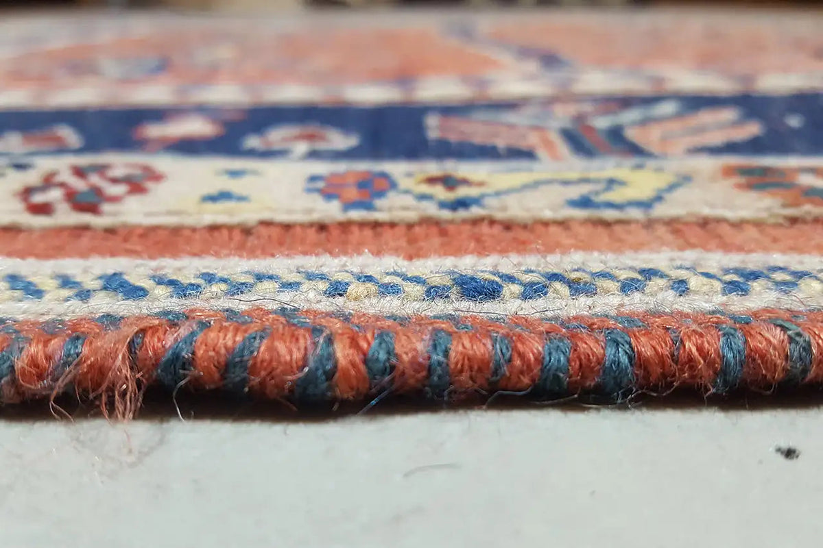 Soumak rug border with blue decorative lines and orange fringes, 149x105 cm