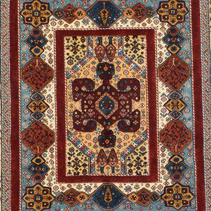 Rug with a red inner border, blue and red ornaments, and a surrounding border