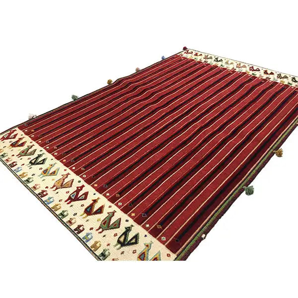 Soumak rug, reddish-brown striped, cream-colored sides with patterns and tassel corners
