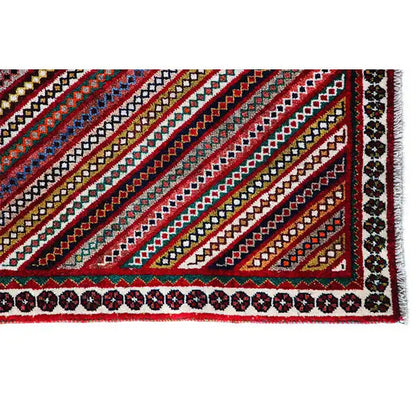 Gabbeh rug with a striped pattern and borders, red, blue, and green color accents, detailed view