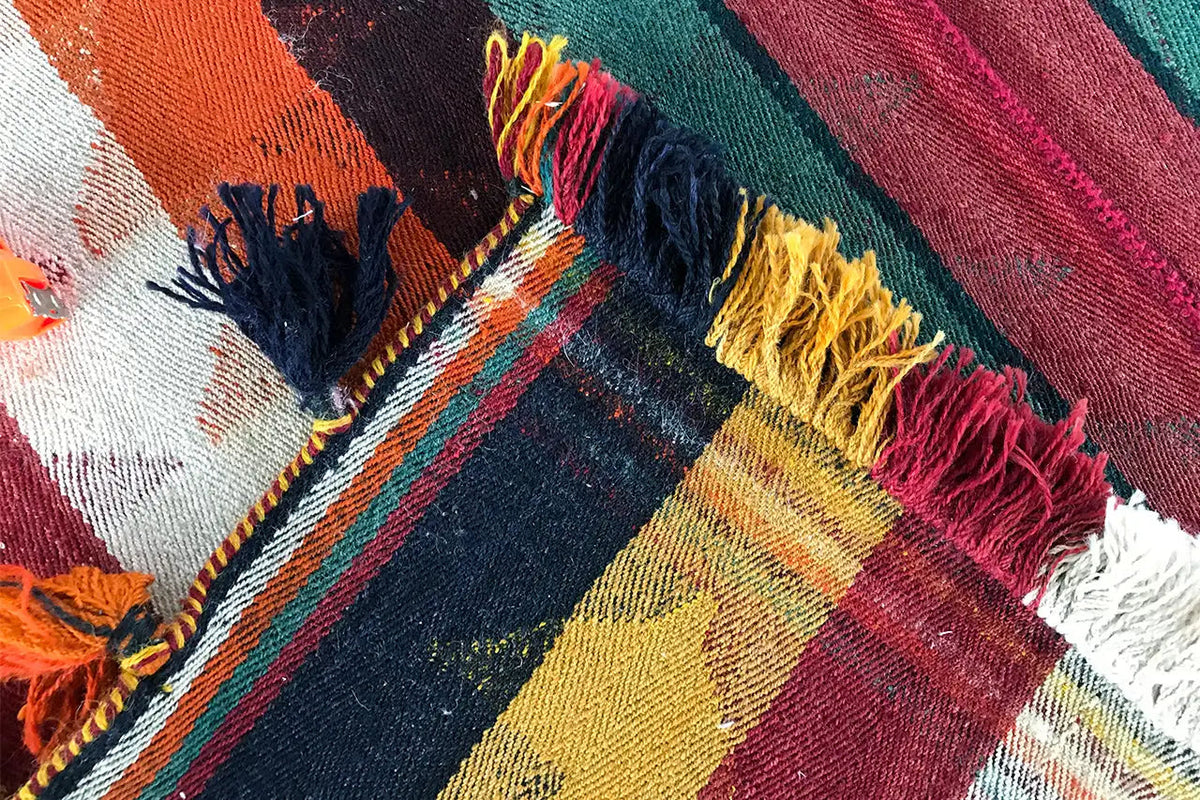 Ecke Jajim rug with fringes in yellow, red, blue, and a striped woven pattern