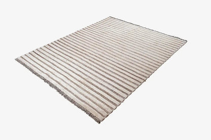 Kelim Gabbeh rug with a striped pattern, beige-brown tones, slightly diagonal view