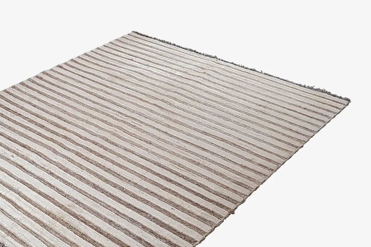 Kelim Gabbeh rug close-up: even horizontal lines in beige and brown