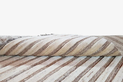 Kelim Gabbeh rug in detail: overlapping edge view and striped weave structure