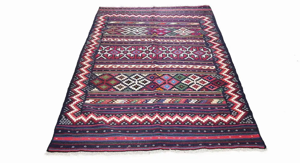 Rectangular kilim rug with zigzag and striped pattern, dark blue, red and turquoise