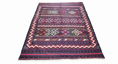 Rectangular kilim rug with zigzag and striped pattern, dark blue, red and turquoise