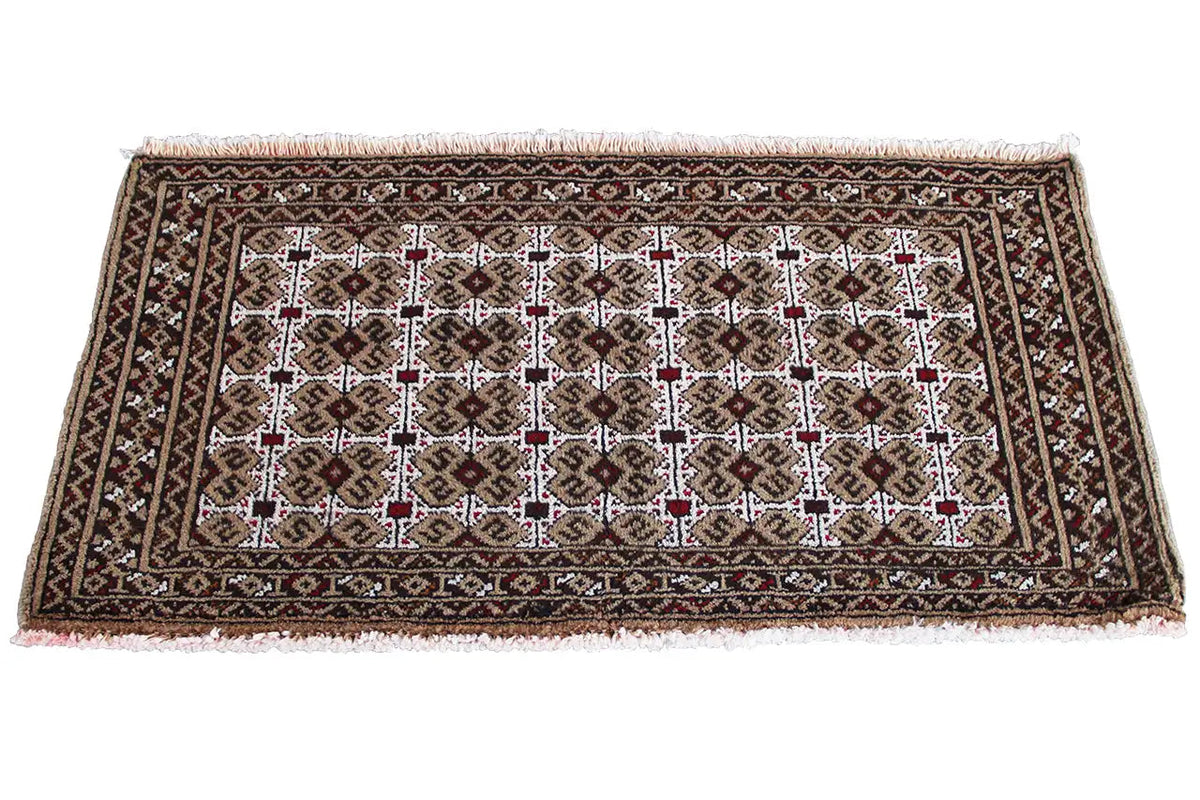 Turkmen rug with a geometric pattern in dark brown, beige, white, and red accents
