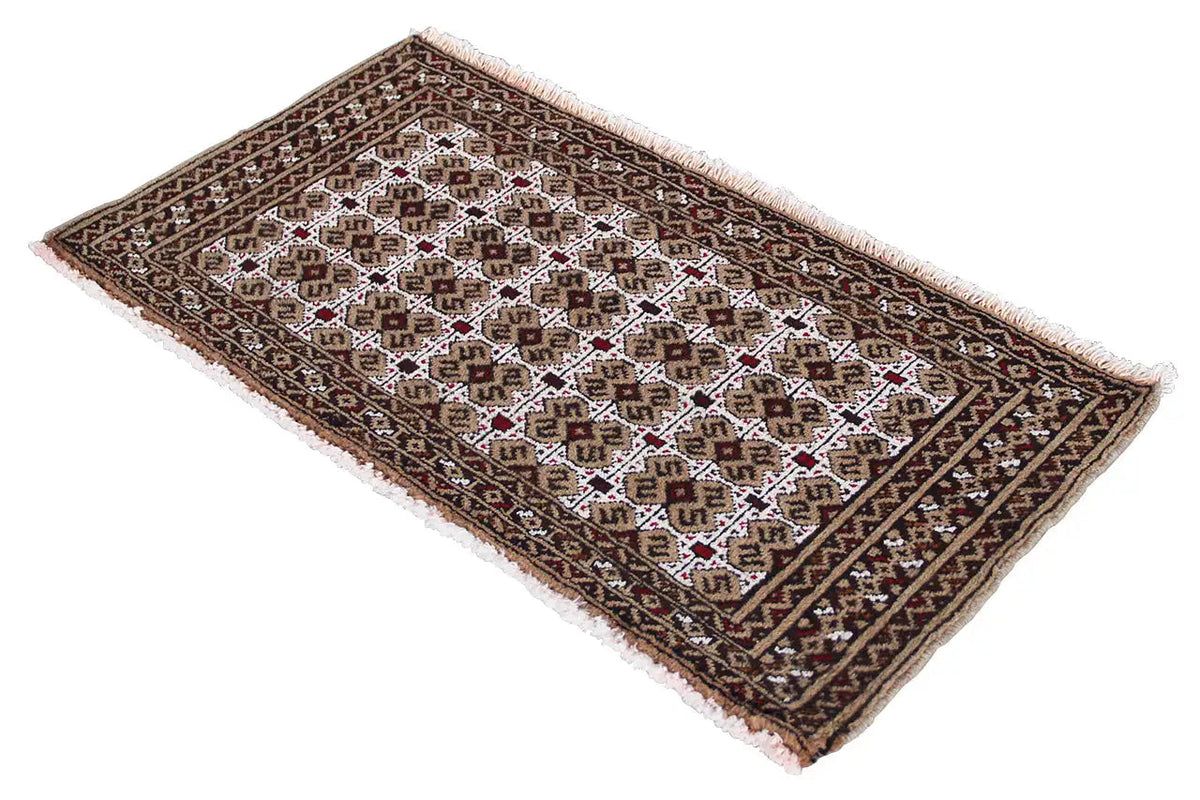Turkmen carpet, spread diagonally, geometric patterns in dark brown and white
