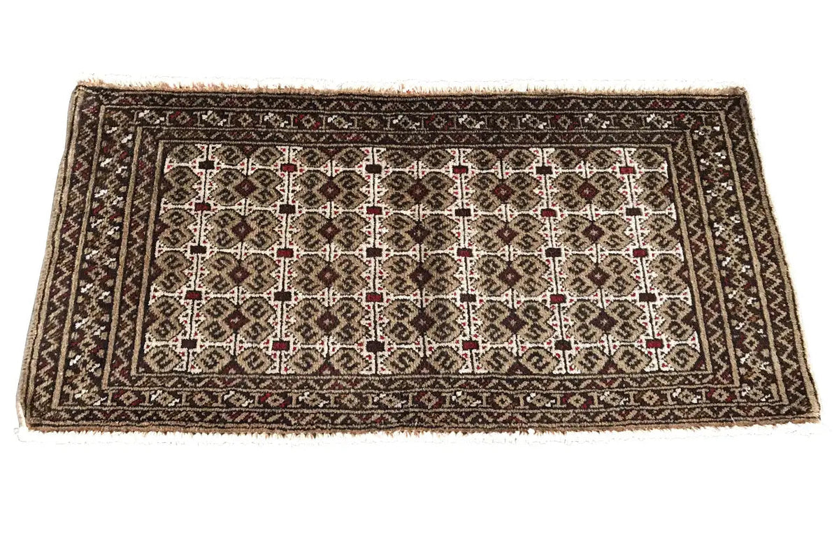 Turkmen carpet 100x52 cm with a geometric pattern in dark brown, beige, and red