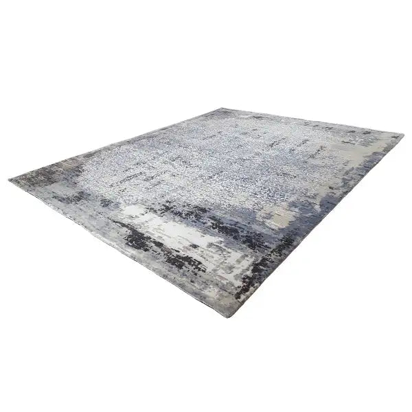 Flat rug with blue-gray, abstract vintage patterns and light accents