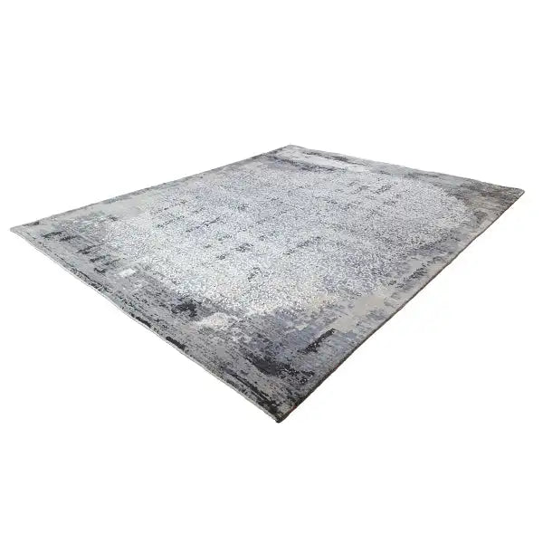 Rectangular rug with an abstract gray-blue mix and light splashes