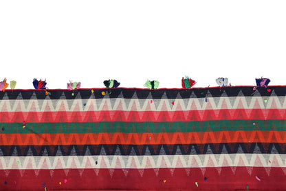 Jajim rug front edge: zigzag and triangular design, fringe with colorful tassels