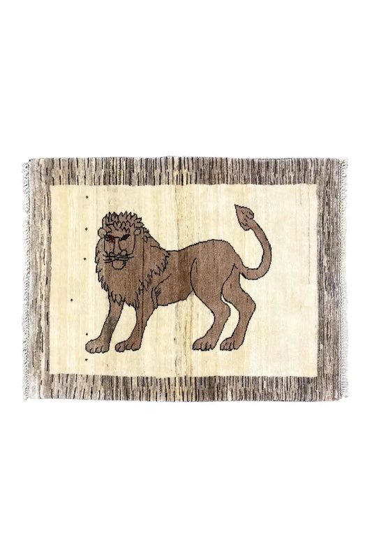Gabbeh rug with lion motif, light beige background, brown border, fringes