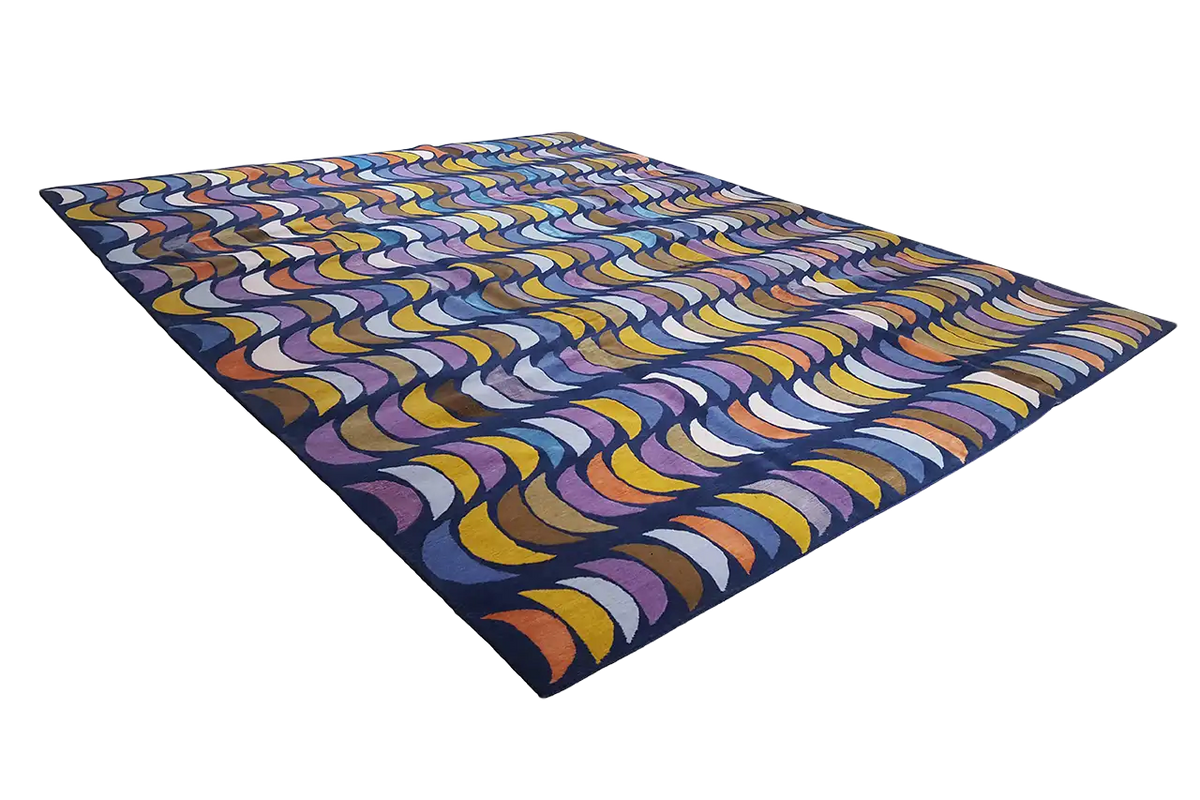 Rug with an abstract wave pattern, diagonal view, blue, yellow, and violet