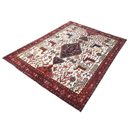 Traditional rectangular rug with a red and dark blue border