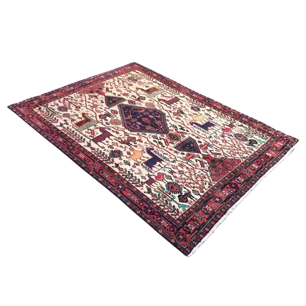 Rectangular rug with a white background, red border, and ornamental central motif