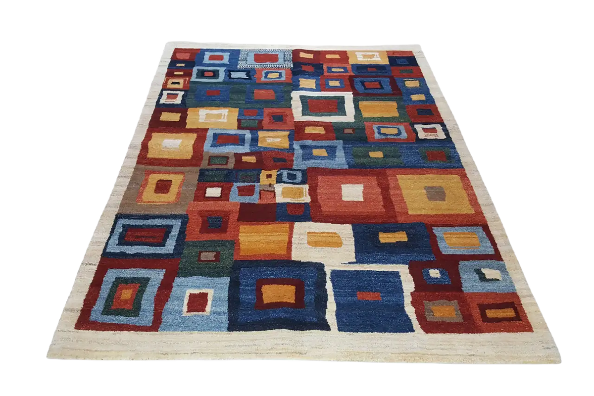 Rectangular rug with colorful squares in blue, red, yellow, and cream