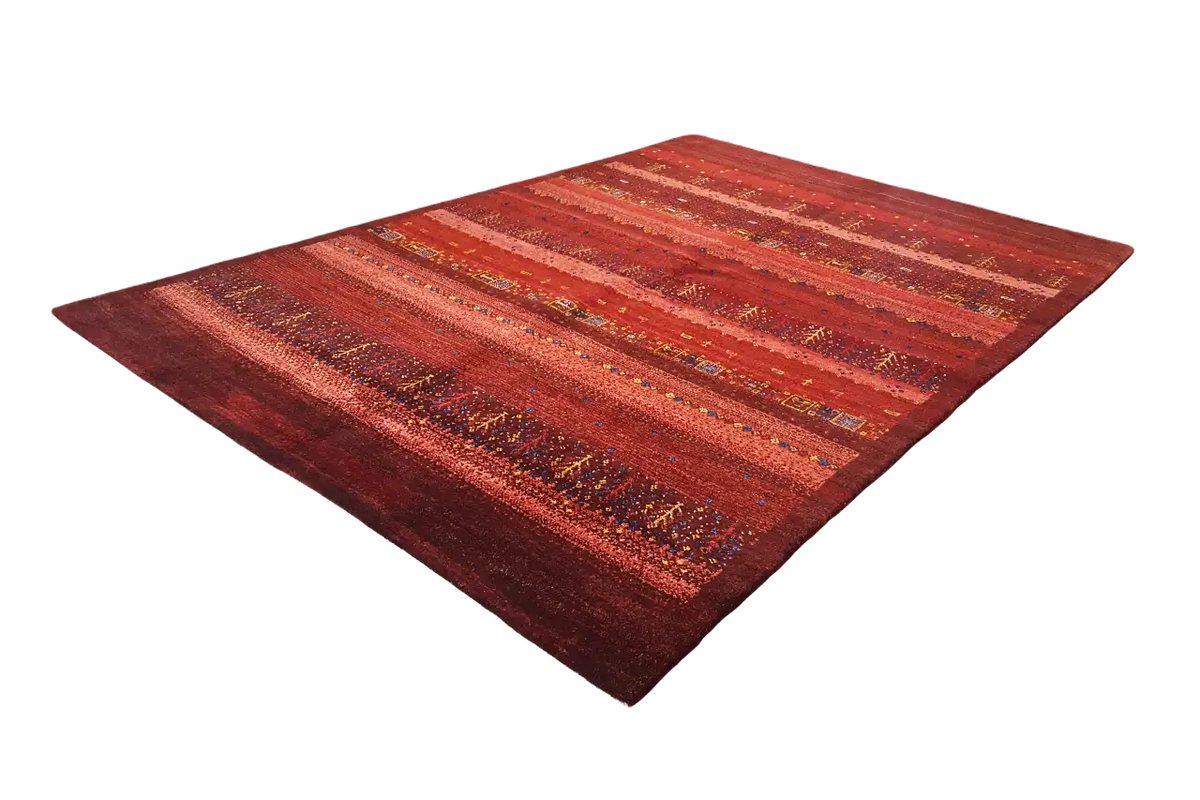 Gabbeh rug with reddish pile, even stripes, and golden-brown color accents.