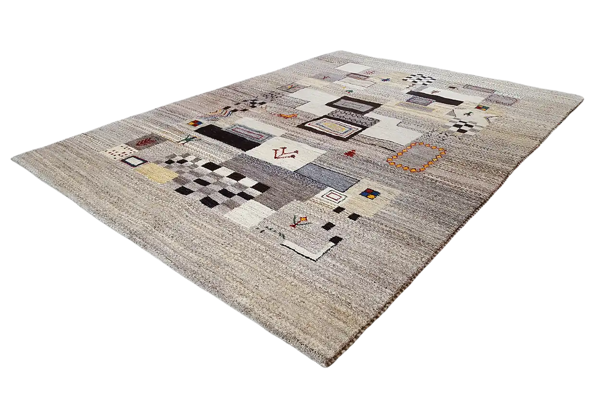 Rectangular Gabbeh rug with geometric patterns in black, red, and blue on a light background