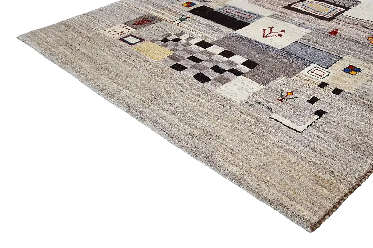 Gabbeh rug with striped and tile-like patterns in multiple colors on a beige background