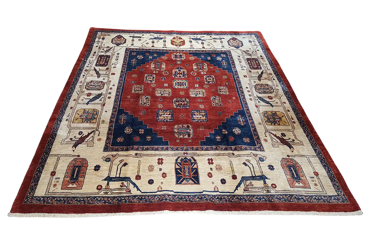 Qashqai classic rug with a red central field, blue medallion, and decorative border