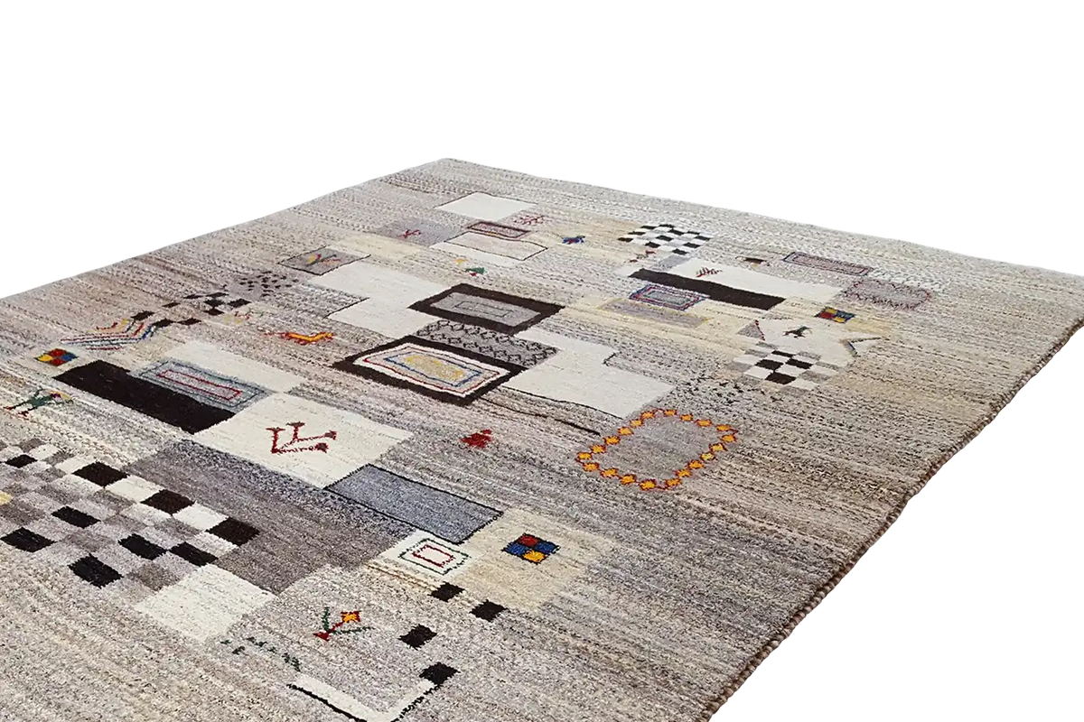 Gabbeh rug with square and line patterns in black, blue, and red on a light background