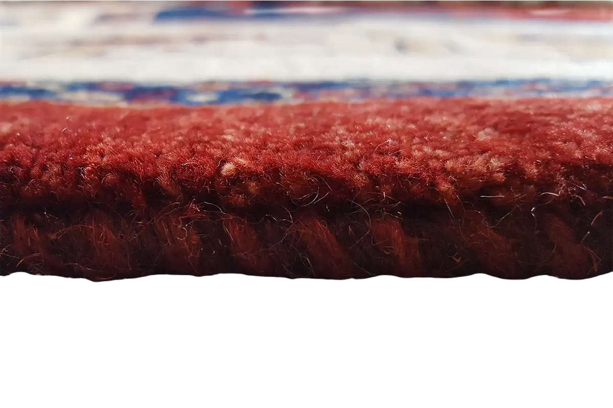 Classic Qashqai rug: red pile edge with fringe, detail view