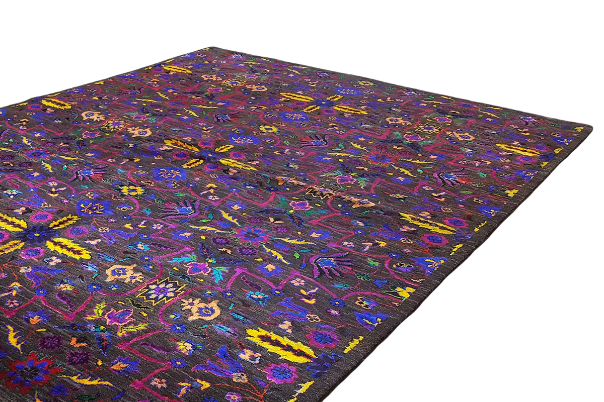 Silk sari with square-ended edges and a colorful pattern on a black background