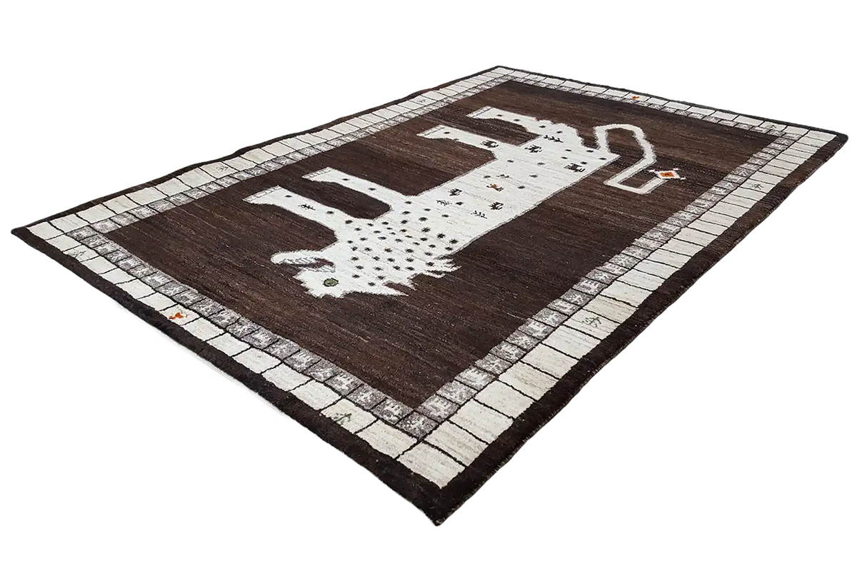 Gabbeh rug with a lion figure made of dots, brown with a beige border pattern